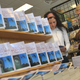Shoppers read about a Chicago program involving the 40th-anniversary edition of Harper Lee’s Pulitzer Prize-winning novel, To Kill a Mockingbird, on Sept. 10, 2001, at a Borders Books and Music store in Chicago. (Tim Boyle/Getty Images)